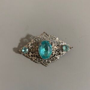 Elegant Silver and Blue Brooch